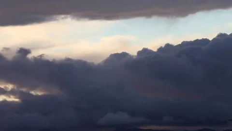 Black clouds sunset  storm sky Nuvole nere tram Stock Footage