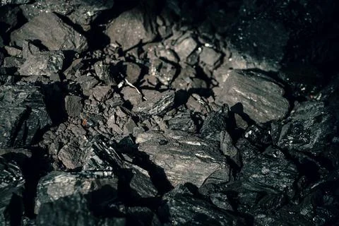 Black coal stones close-up. Solid advertising background. Foto stock