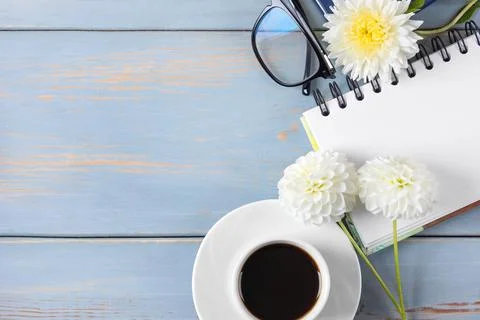 Black coffee and opened blank notepad Stock Photos