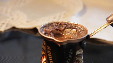Black coffee brewed on the stove Video stock 83719625