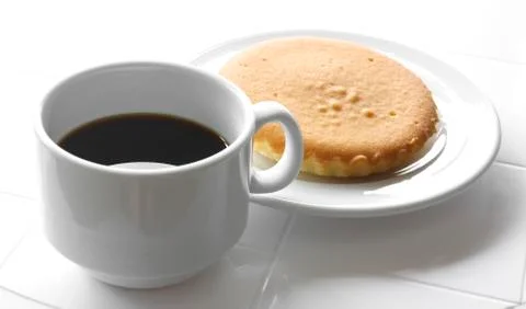 Black coffee with butter cake Stock Photos