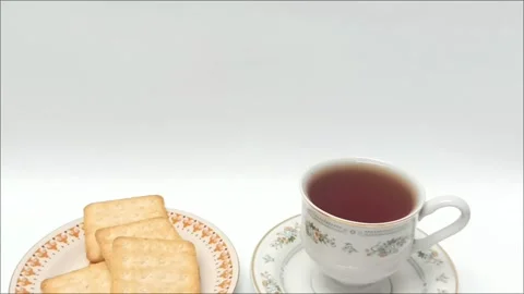 Black coffee cup with crispy crackers on white background view Stock Footage 343510221