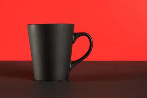 Black coffee cup on red background Foto stock