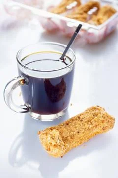 Black Coffee with eclairs Stock-Fotos