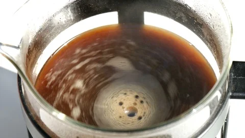 Black coffee foam surface slowly rotates 库存影片 115367004