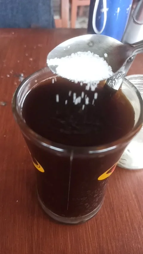 Black coffee not too much sugar Stock Footage 229681342