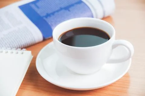 Black coffee with note paper for text on wood table Stock Photos