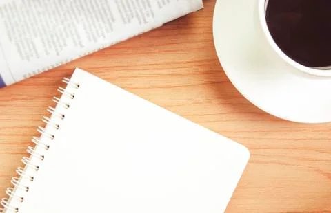 Black coffee with note paper for text on wood table Stock Photos