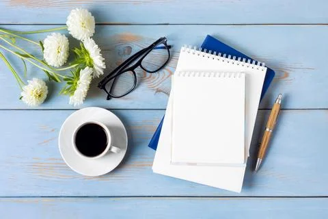 Black coffee with opened blank notepad Stock Photos