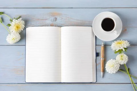 Black coffee with opened blank notepad Stock Photos