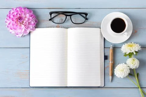 Black coffee with opened blank notepad Stock Photos