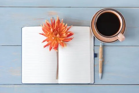 Black coffee with opened blank notepad Stock Photos