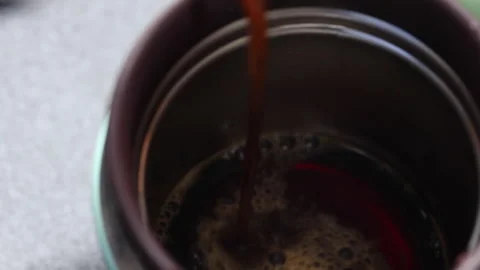 Black coffee poured into a cup. Stock Footage 245630837