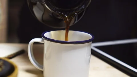 Black Coffee Pouring Into A Cup Stock Footage 127303792