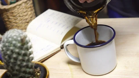 Black Coffee Pouring Into A Cup Stock Footage 127304026