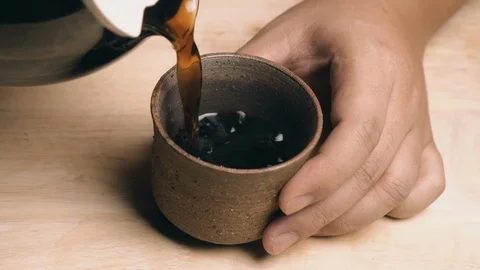 Black Coffee Pouring Into A Cup Stock Footage 127306276