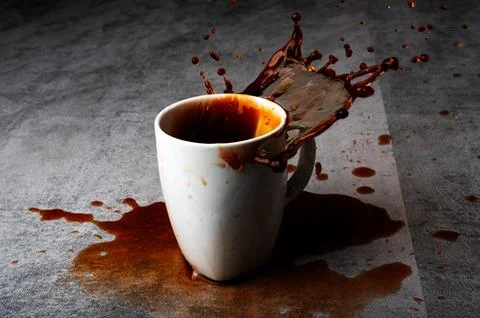 Black Coffee Splashing Dramatically in Cup Stock Photos