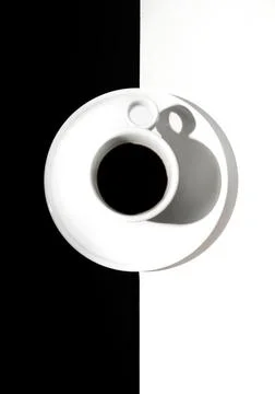 Black Coffee in a White Ceramic Cup on a Monochrome Background Stock Photos