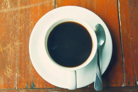 Black coffee in a white cup on the table. Foto stock