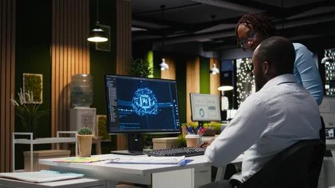 Black colleagues team using AI analytics platform for monthly data reports Fotos Stock