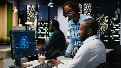 Black colleagues team using AI analytics platform for monthly data reports Fotos Stock