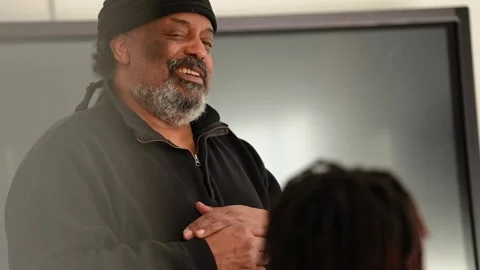 Black college professor interacting with students 6 Stock Footage 265828191