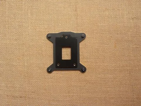 Black color computer CPU retention bracket plate Stock Photos