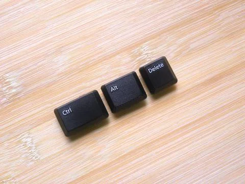 Black color Ctrl Alt Delete keys of computer keyboard Stock Photos