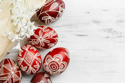 Black colored Easter eggs. Pysanka on white Stock Photos