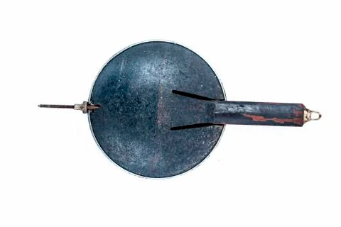 Black colored pendulum isolated on white used in big wall clocks. Stock Photos
