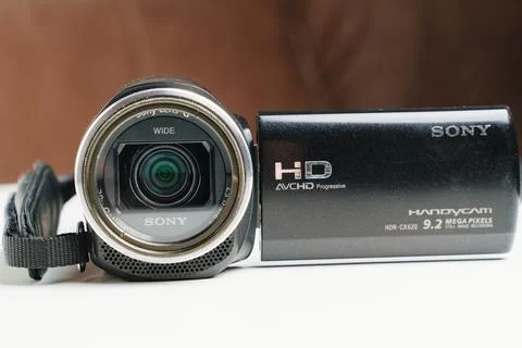 Black compact video camera sony with monitor. Stock Photos