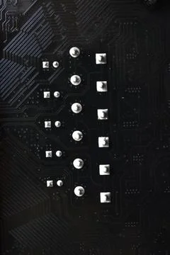 Black computer chip close-up with elements and tracks Foto stock