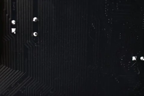 Black computer chip close-up with elements and tracks Stock Photos