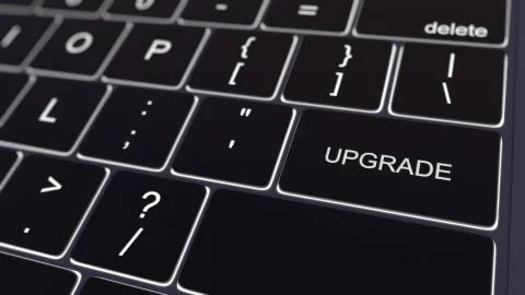 Black computer keyboard and glowing upgrade key. Conceptual 3D rendering Stock Illustration