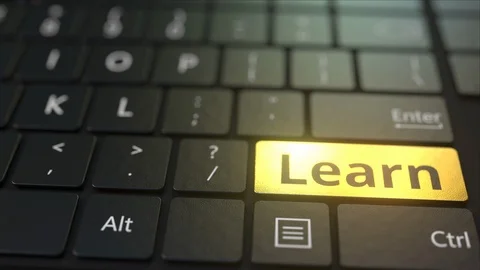 Black computer keyboard and gold learn key. Conceptual 3D animation Stock Footage 116479861