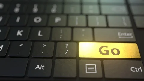 Black computer keyboard and gold go key. Conceptual 3D animation Stock Footage 116482461