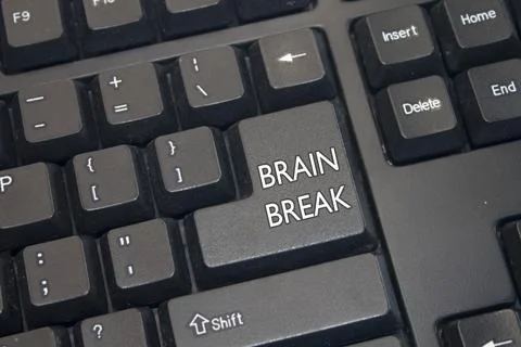 Black Computer Keyboard with Brain Break text. Close-up of an electronic Comp Stock Photos