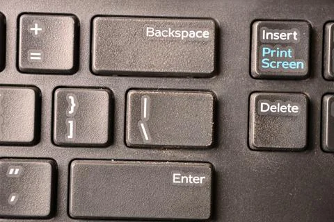 Black Computer Keyboard Macro Shot Highlighting Backslash Key with Soft Blu.. Stock-Fotos