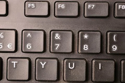 Black Computer Keyboard Macro Shot Highlighting 7 and Ampersand Key with So.. Stock-Fotos
