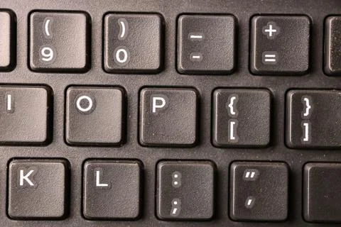 Black Computer Keyboard Macro Shot Highlighting P Key with Soft Blurred Bac.. Foto stock