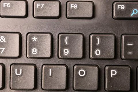 Black Computer Keyboard Macro Shot Highlighting 9 and Left Parenthesis Key .. Stock-Fotos