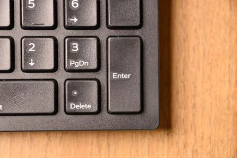 Black Computer Keyboard Macro Shot Highlighting Enter Key with Soft Blurred.. Stock-Fotos