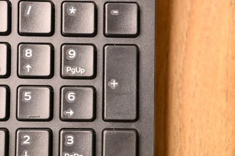 Black Computer Keyboard Macro Shot Highlighting Numeric Keypad Plus Key Top.. Stock Photos