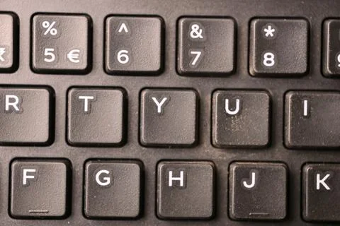 Black Computer Keyboard Macro Shot Highlighting Y Key with Soft Blurred Bac.. Foto stock