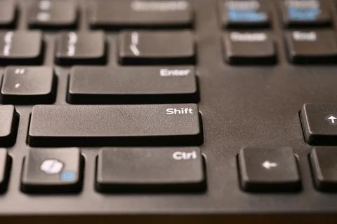 Black Computer Keyboard Macro Shot Highlighting Shift Key with Soft Blurred.. Stock Photos