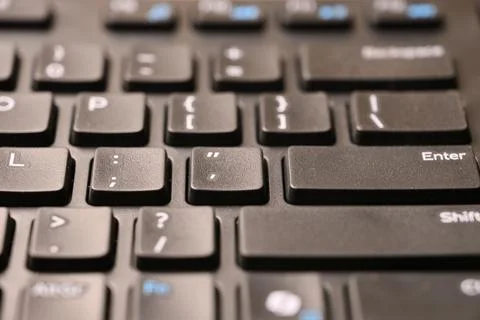 Black Computer Keyboard Macro Shot Highlighting Quote and Double Quote Key .. Foto stock