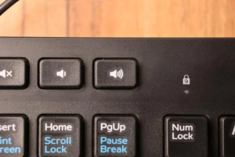 Black Computer Keyboard Macro Shot Highlighting Increase Volume Key with So.. Stock-Fotos