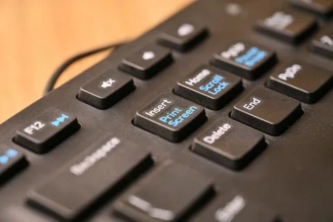 Black Computer Keyboard Macro Shot Highlighting Insert and Print Screen Key.. 스톡 사진