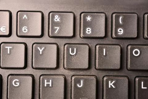 Black Computer Keyboard Macro Shot Highlighting U Key with Soft Blurred Bac.. Stock-Fotos