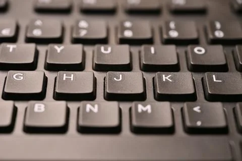 Black Computer Keyboard Macro Shot Highlighting J Key with Angled Top View .. Foto stock